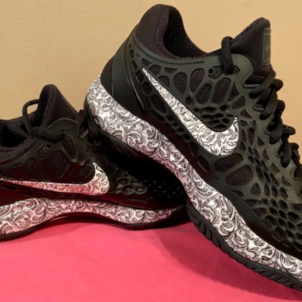 Nike Zoom Cage 3- women's 7